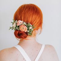 A beautiful arrangement of flowers to wear in your updo or with a veil. Our florists carefully attach each bloom to a transparent hair comb, which is easily secured to a braid or a bun. A pretty accessory for any special occasion. Select your preferred flower color palette, or choose "Custom Palette" and leave your col