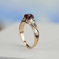 The default design option features 6mm LAB Grown Round Ruby, SI1-Clarity, VG-Cut, Ex-Polish, VG-Symmetry with Colorless D Moissanite Accent Stones in 14K Rose Gold Engagement Ring. Model 33-6 Also you can fully customize and engrave this ring by clicking the button "Personalize in 3D". As well please remember it takes up to 19-21 days to make and ship this item.