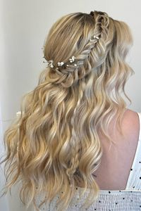 Looking for the perfect braided wedding hairstyles? Check out our list of 21 beautiful braid hairstyles for brides with long, short, and black hair. Whether you want an updo, half up, or boho look, we've got great braid wedding hairstyle ideas and inspiration for your special day! Wedding beauty tips included.