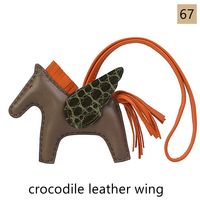 These horse bag charms are hand-sewed with high quality lambskin leather (body and string), with crocodile leather wing or ostrich leather wing. 50 colors. 
#awulook #awulookstrap #bagcharm #minihorse #miniflyinghorse #hermes