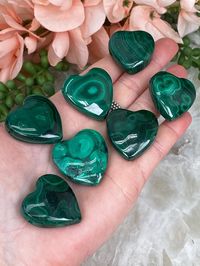 Small Green Malachite Heart Pendants from DR Congo. Each of these malachite pendants has unique colors and lining, so you get to choose your exact one of course. Each malachite heart has a hole drilled through horizontally for a chain. These are handmade, so they are not perfect. Some have a fill spot on the sides. Choose your exact malachite pendant in the dropdown menu. Pendants are approx. 1-1.25" wide and .25" deep You will receive the exact malachite heart pendant you choose. --- Be sure to