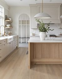 Two toned kitchen cabinets are a gorgeous design trend and we're sharing 17 of our favorite kitchens for inspiration!