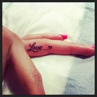 Or maybe this, with our anniversary. I like the finger tattoo idea.