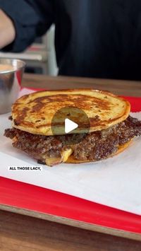 Allrecipes on Instagram: "Someone cooked here 👉🍔

Never heard of a Crust Burger? That ends today. Nicole shares all the tips and tricks she learned at the Food & Wine Classic Charleston for this perfect sandwich, coined by the cooking wizard, Chef Sean Brock. We’ll take this over a regular smash burger any day! 🤌

2 teaspoons softened butter
1 potato hamburger bun
2 ounces 70% lean ground beef
salt and freshly ground black pepper to taste
1 very thin slice onion
1 slice American cheese, such as Kraft Deluxe® American cheese slices
1 tablespoon mayonnaise
2 teaspoons ketchup
1/2 teaspoon hot sauce, such as Crystal® hot sauce
1/4 teaspoon fish sauce

Heat a heavy skillet or griddle over medium heat. Spread butter over top of bun and bottom of bottom bun and place in skillet. Press down fi