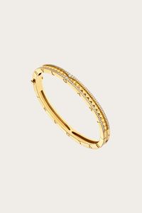 B.zero1 Rock 18 kt yellow gold bracelet with studded spiral and pavé diamonds on the edges  $14,400.00