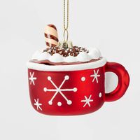 Add sweet charm to your holiday tree with this Glass Hot Cocoa Mug Christmas Tree Ornament from Wondershop™. This glass ornament looks just like a hot cocoa mug, complete with whipped cream and snowflake detailing on the front for a fun look. Plus, the sparkly loop makes for easy hanging. Whether you gift to a loved one or place it on your own tree, this ornament is sure to be a hit. Welcome to the Wondershop™.