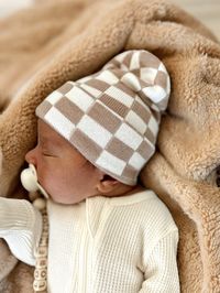 Baby’s First Hat! A hospital bag necessity & perfect for introducing your baby to the world. This soft & stretchy checkered hat is available in only one size: newborn! Material:100% PolyesterImported Care Instructions:Hand Wash ColdLay Flat to Dry