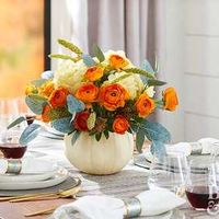 thanksgiving table pumpkin centerpiece with flowers