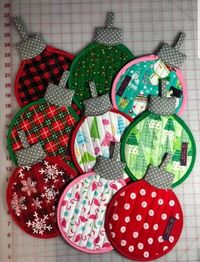 Ornament Hot Pad For Your Christmas Kitchen,Christmas ornament pot holder pattern,Strips and Scraps Are Perfect Reds and greens make a festive display in your kitchen, or sew them up in any color combo's. Selecting scraps twelve str...