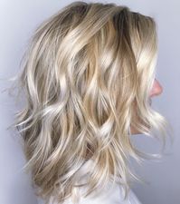 Blonde Wavy Shag with Platinum Highlights