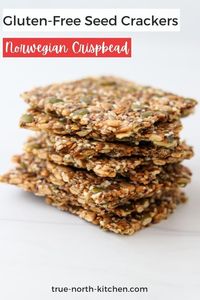 Whether you call these crackers or Norwegian Crispbread (Knekkebrød), these golden, crispy seed crackers are a dream, both to make and to eat! 5 different varieties of seeds come together with the help of a little water and cornstarch to create one of the best homemade gluten-free crackers you'll ever enjoy.