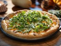 Get Butternut Squash and Arugula Pizza Recipe from Food Network