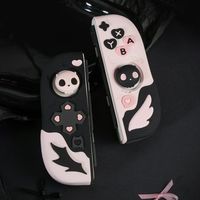 The GeekShare Skull Joy Con protective Case,which is made of Silicone material. The Silicone Joy Con Cover are in 3D so you can touch them when you're bored. The handle case is printed with skull and wing patterns, and the lively and lovely patterns make the whole vibrant. Joycon cover can fit for the regular switch and switch oled . Come with the a pair of customized thumb grip caps. if you want a joy con case that both looks good and practical, don't missing it . Color: Pink.