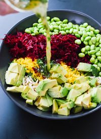 Colorful beet salad with carrot, quinoa & spinach