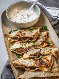 Arayes is a popular Middle Eastern dish of stuffed and grilled (or baked) pita bread filled with kafta (minced meat, herbs and spices).