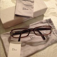 Dior by Christian Dior Glasses Amazing DIOR glasses! Love glasses and built a collection as can see from my listings. Used a few times. Frames in great condition! No sign of wear! Solid brown front with a brown and blue leopard print side. Comes with hard case, cleaning cloth and pouch. Place your own prescription in. Dior Accessories