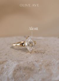 14K Yellow Gold | Alcott features a bold lozenge center stone set in a basket setting on a stunning tapered shank.