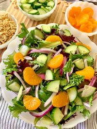 Elevate your salad game with this simple yet satisfying Crunchy Mandarin Salad recipe, complete with a savory poppyseed dressing.