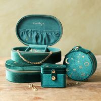 Oval travel jewellery case  	In soft deep teal velvet  	Gold constellation design  	With gold zip fastening  	Designed in-house      Please note: this jewellery case features the Lisa Angel logo on the inside and base.   Product Information    An oval travel jewellery case in rich teal velvet, printed with shimmering gold stars and constellations on top, with small jewellery sections and rolls inside for storing your favourite jewellery pieces at home or on the go. A wonderful gift for her to tu