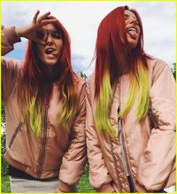 bella thorne dyes bright red hair 01