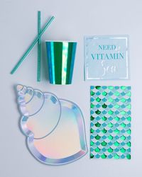 Delight your mermaid fan with this shimmery and shiny mermaid tail designed napkin, a total must-have for any under the sea themed party. Shell yeah! Purchase includes a pack of 16 napkins