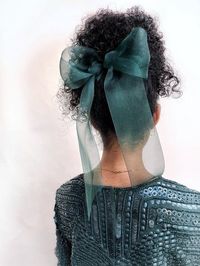 Oversized bow barrette available in three pastel shades of peachmintand lavenderand deep tones of evergreenburgundynavyand blackAdds a beautiful touch to your hairstylestyle it with your hair tied backhalf upor to the sideMade in NYC.