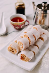 Zhaliang is a Cantonese dim sum dish of Chinese fried dough (youtiao) wrapped inside rice noodles. Our zhaliang recipe will show you how to make it at home! Source: thewoksoflife.com