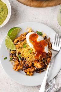 This quick and easy southwest chicken skillet dinner uses rotisserie chicken, fresh veggies, canned beans and simple spices for a delicious meal that’s ready in just 15 minutes!