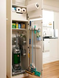 love this organized broom closet