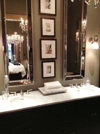 Master bathroom What a lovely bathroom! I love the wall color in contrast with the black and white photos.