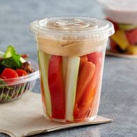 Go green with this Fabri-Kal 12 oz. parfait cup combo! Perfect for yogurt parfaits, veggies and dip, or other snack combos, this parfait cup combo is a convenient way to hold multi-ingredient grab-and-go creations! Ideal for your deli, coffee shop, kiosk, or ice cream shop, this cup combo can be used to hold granola mixes and nuts for yogurt, dressing for veggie cups, or dip for fruit cups. This combo kit comes complete with a clear 12 oz. compostable clear plastic cold cup, a plastic no-slot li