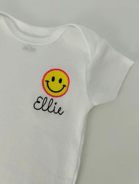 Excited to share this item from my #etsy shop: Embroidered personalized retro smiley face baby onesie, embroidered smiley face baby onesie, embroidered happy face baby bodysuit, smile