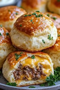 Garlic Parmesan Cheeseburger Bombs are cheesy, savory snacks wrapped in golden biscuit dough. Try this easy recipe today!