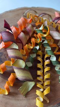 Dehydrated spiral garnishes! 🍋 🥕 Whether using a dehydrator or the oven, patience is key with this! It is SO worth the end result. #lowwaste #slowliving #foodwaste #sustainability #mocktails #mocktail #garnish #dehydratedfood #urbanhomestead #sobercurious #healthylifestyle #citrus #denver #lowwasteliving #vegan #soberwomen #citrusrecipes