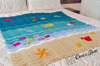 ** INSTANT DOWNLOAD ** THIS LISTING IS FOR A PATTERN ONLY - NOT A FINISHED PRODUCT Grab your hooks and get ready to go on an ocean adventure I'm so thrilled to introduce my newest pattern - the Sealife Blanket! This design incorporates the simplicity of a ripple blanket with 11 customizable appliques. Add as few or as many details as you like! * Skill Level: Easy / Intermediate Measurements: * Blanket: 37.8x41 inches (96x104 cm). * Crab: 4.3 inches (11 cm). * Conch: 1.5 inches (4 cm). * Shark: 4