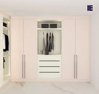 Redo your wardrobes with the finest walk-in wardrobe designs from Inspired Elements. Here comes the latest range of small walk-in hinged glass door wardrobe internal storage in pink & premium white finish. The wardrobe gives a premium feel with space for everything