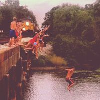 jump from a bridge into a lake