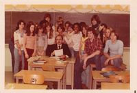 Retro photo of teacher and class