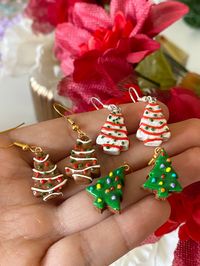 Christmas is right around the corner! these handmade earrings are a perfect gift for your friends, kids, or yourself!! tree cakes are 0.75” in length Earrings are sterling silver! Hypoallergenic and 925 stamped! Please note:polymer clay charms are durable, but still need to be handled with care (: These clay charms are hand made and are not perfect! They may vary from the one in the picture but still just as cute!Colors may not be the exact same shade as the photo due to the lighting. All charms