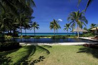 Enjoy unrestricted ocean views as the shimmering blues of the day melt away into fiery sunsets. Slicing a sparkling ribbon through this vivid aquamarine vista is the villa’s black-tiled 25-metre pool surrounded by ample lawn, coconut palms and terracing.