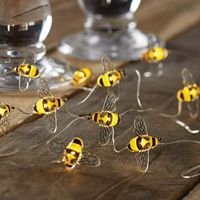 Decorate your home or any event that you may have with this Mainstays 18 LED Bumble Bee Wire String Lights. The unique design will surely delight everyone around. It is perfect for weddings, or floral arrangements. This light set is equipped with Battery Operated Automatic Timer, so that you can set it up to light and it can turn on again at the same time the next day. The string lights has 6Ft lighted length and 7Ft total length. The lead cable from the battery box to the first LED is 12 inches