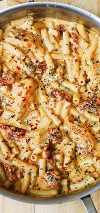 Chicken with sun-dried tomatoes and penne pasta in a creamy mozzarella cheese sauce.