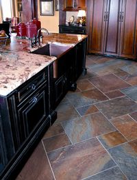 Slate kitchen flooring may be your answer to durability, beauty, and style