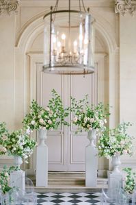 White and Peach Ceremony Flowers by Molly Carr Photography | Château Champlatreux | Paris, France | Spring Wedding Flowers | Romantic Wedding Floral Ideas | Elegant Fine Art Wedding Arrangements for a Destination Wedding | Fine Art Wedding Photography #weddingflowers #weddingphotography #pariswedding