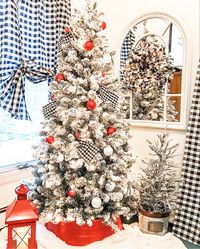 Cozy bedroom Christmas tree decorated with buffalo check