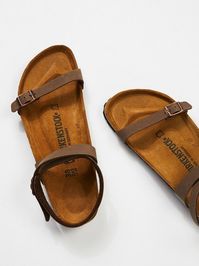 Daloa Birkenstock | Easy strappy sandals with an adjustable ankle strap and toe band with Birko-Flor uppers. Molded footbed and shock-absorbing EVA sole.