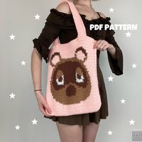 "This is NOT A PHYSICAL ITEM but a downloadable PDF file of the pattern for this jumper! This pattern uses US crochet terminology. Bag is 13.5\" wide and 15\" in length (not including straps). A reversible bag of one of my favourite cosy games! The strap is made using the thermal stitch to create a sturdy bag strap - I have provided a description of how to do this but would suggest following a video if you have never used it before!  I would not suggest this pattern for a very beginner as it uses colour changing techniques that can be tricky for your first project, but I believe this would be suitable for a more advanced beginner who has got their head around the basic stitches. This pattern contains both traditional written instructions and a grid of the design for you to follow. @cosybea