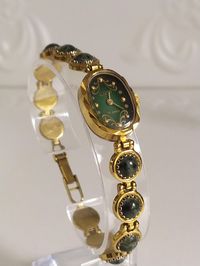 Vintage ladies wind up watch Ray,Natural Green jasper stone  watch RAY, Rare cocktail watch, Wristwatch Luch women watch Brand: Luch/Ray Style:Casual, Classic Number of Jewels: 15 jewels Watch dimensions:  length is 20  cm (8.26 inches) Case color: gold Type:Wristwatch Condition:good working condition Package: in a gift box Band/Strap: natural jasper stone   Shipping: Watch will be carefully packed and send without delays. This gold  tone watch is perfect as women accessory.  Shipping: Watch will be carefully packed and send without delays. For more items visit my shop mainpage: *All photos are real. *You buy exactly what you see in the photos. * Please note that due to lighting effects, monitor's brightness, contrast etc. there might be some slight differences in the color tone/shade of t