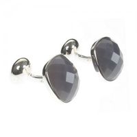 A simple elegant but modern cufflink design, cut grey agate stone is encased in sterling silver with a silver swivel back