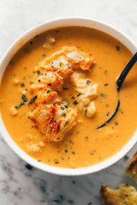 Lobster Bisque recipe made easy with big chunks of garlic butter lobster tails in every bite and a quick homemade stock! So smooth and creamy!